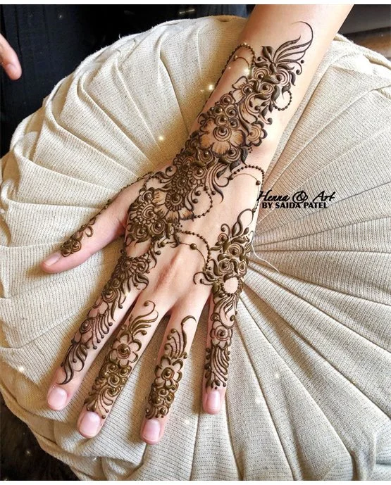 Hook Inspired Stunning Back Hand Mehndi Design
